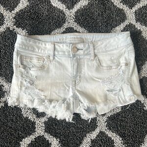American Eagle Super Low Shortie Distressed Light Blue Denim Shorts Size 8
